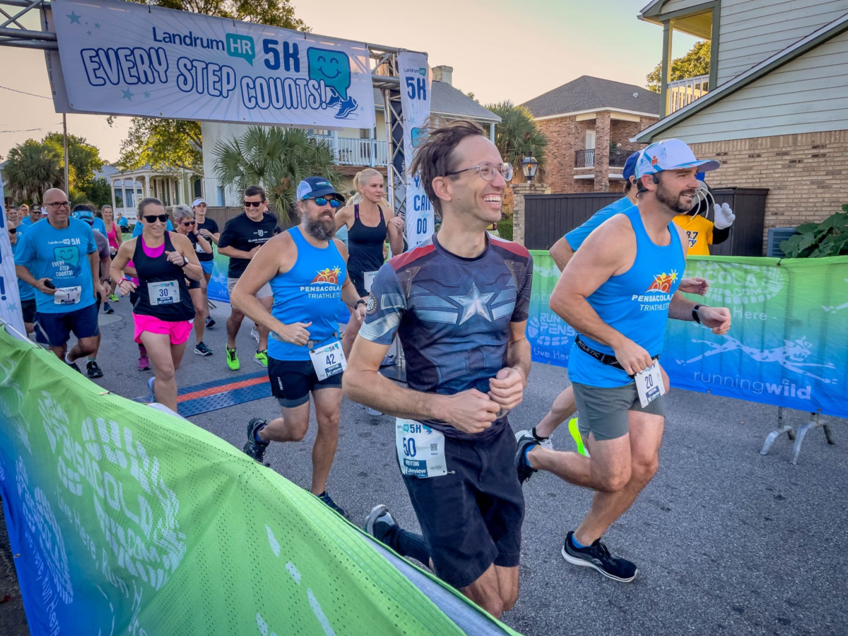 Runners crossing finish line