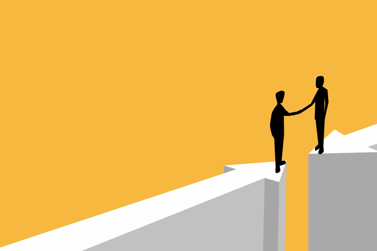 Silhouettes of two people reaching across a gap between large white arrows, symbolizing support, collaboration, and bridging challenges.